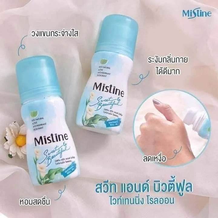 Mistine roll-on deodorant bottles with light blue caps and white floral Sweet & Beautiful label
