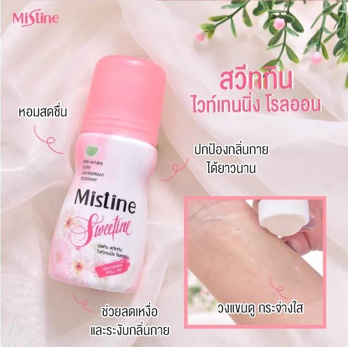 Mistine Sweetfine roll-on deodorant, bottle and hand applying to underarm