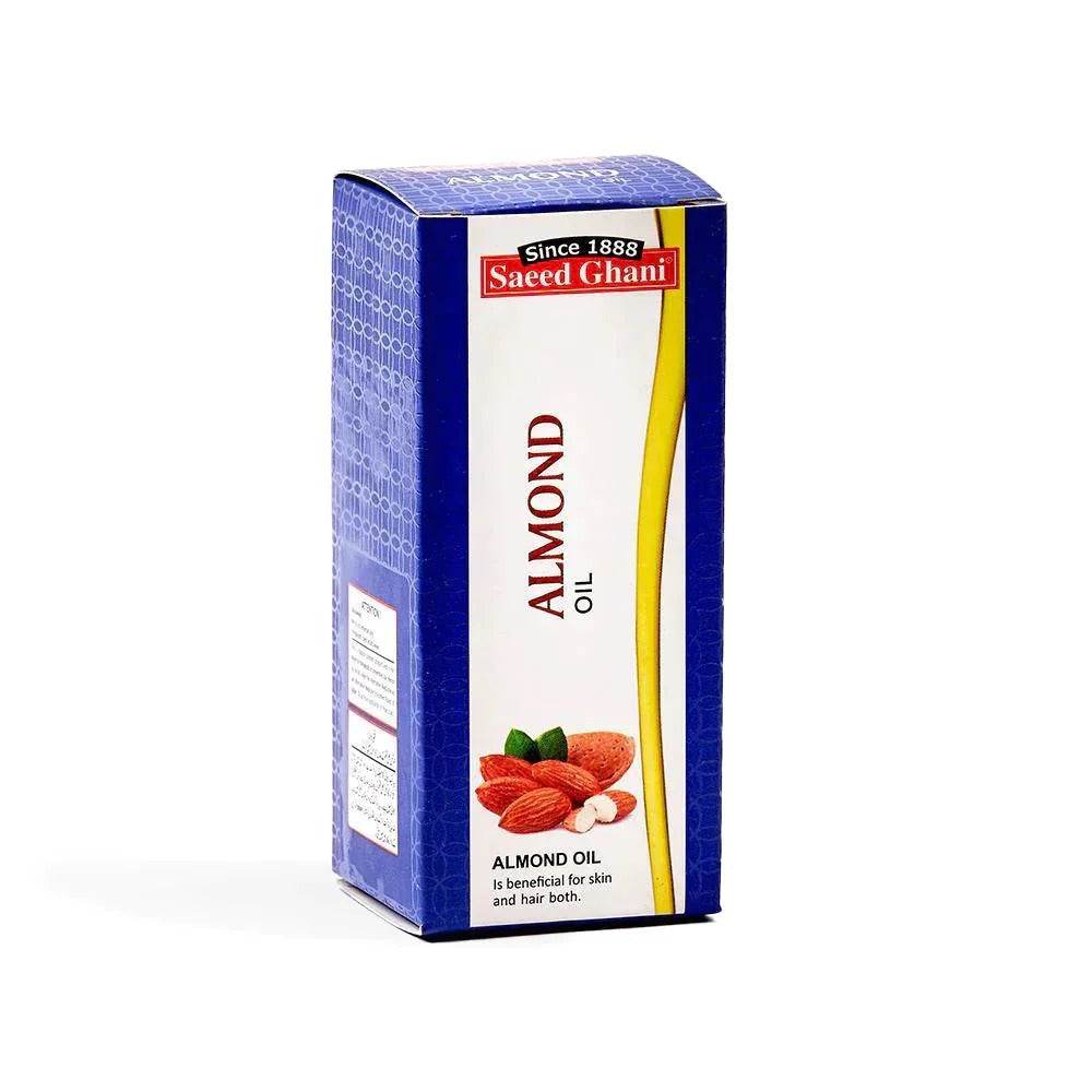 Almond hair oil box, blue with yellow stripe and vertical Almond Oil label